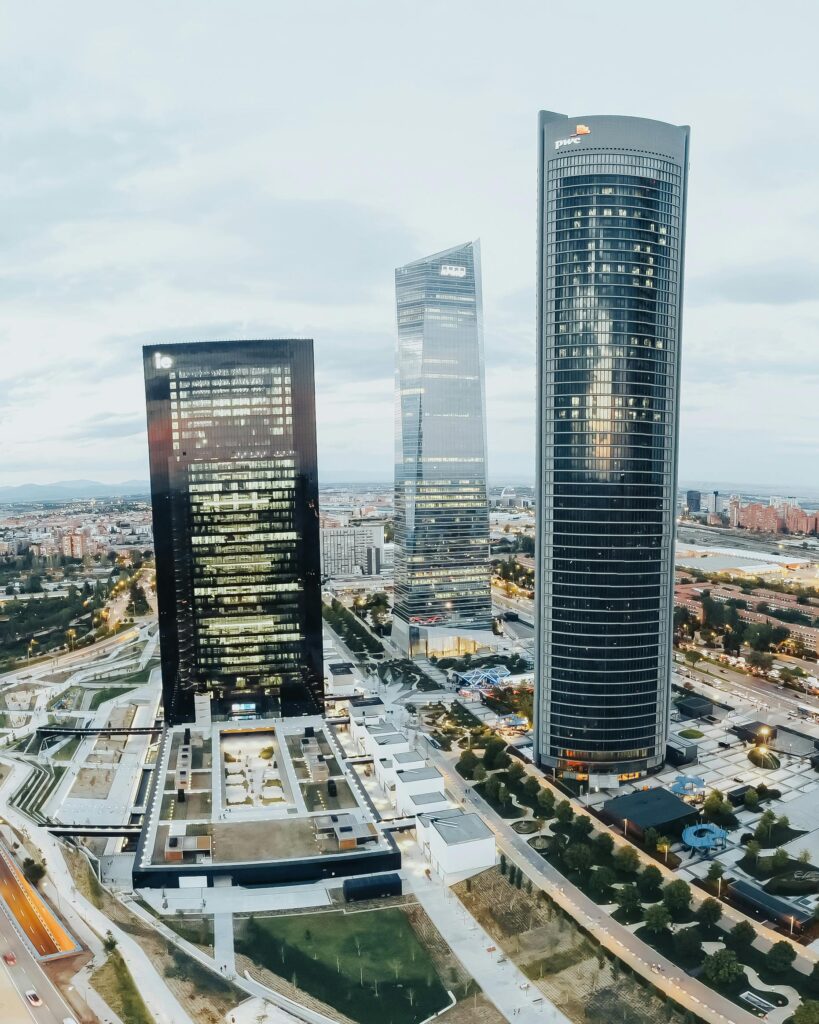 pexels-photo-10999503-10999503 Aerial view of iconic skyscrapers in Madrid's Cuatro Torres Business Area.