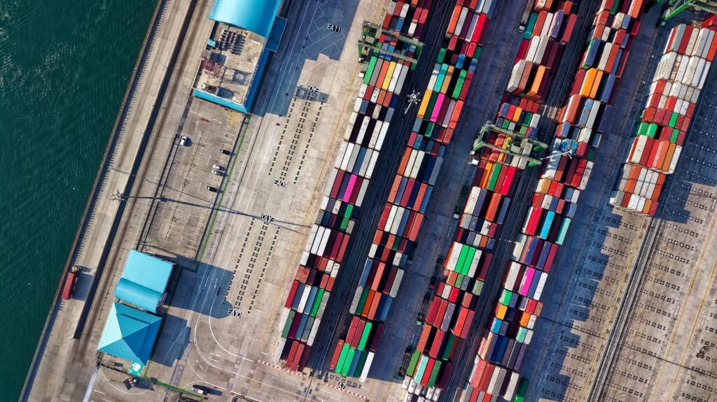 pexels-photo-1427107-1427107 Top view of colorful shipping containers at a bustling port in Jakarta, Indonesia.