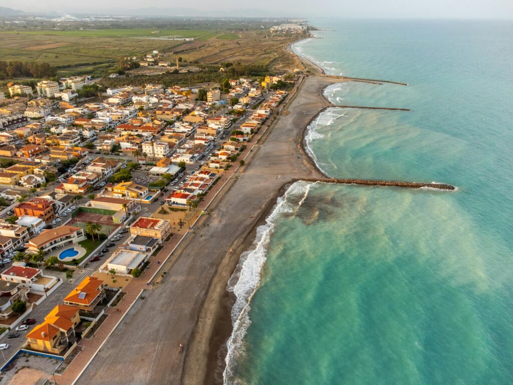 Stunning aerial view of Casablanca beach and town in Valencia, Spain on a sunny day.