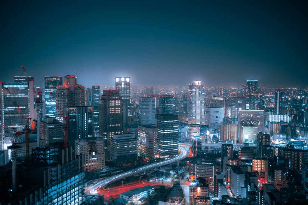 pexels-photo-31008030-31008030 Stunning aerial view of Osaka's city lights and skyscrapers at night.